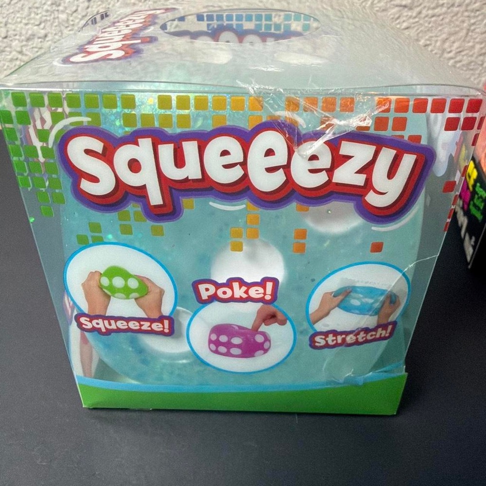 Squeeezy Blue Glitter Dice Squishy